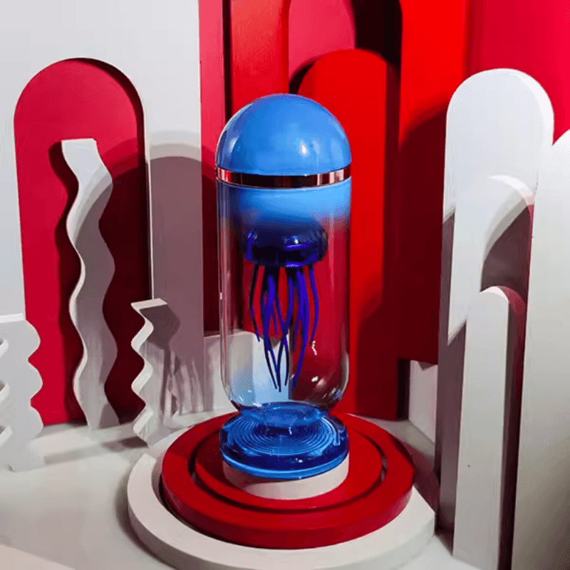 機械リズムの青いカプセル クラゲ キネティック メタルモデル ガラスカバー付き - ビルディングブロック