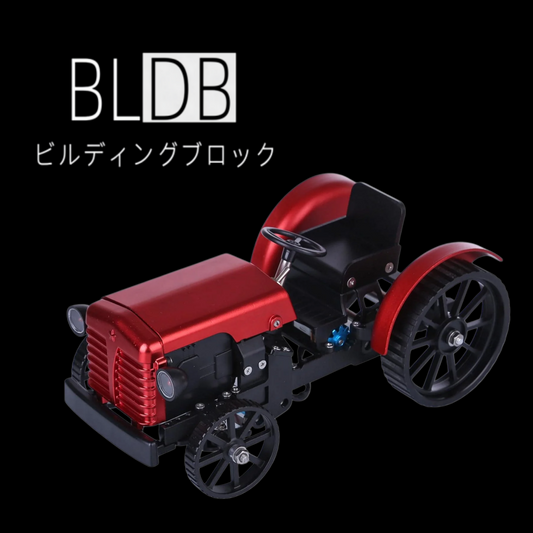 赤い外装と大型後輪を備えたDM616電動メタルトラクターの完成状態